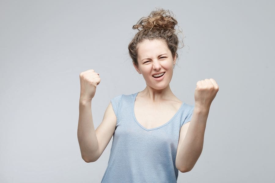 A woman celebrating a victory